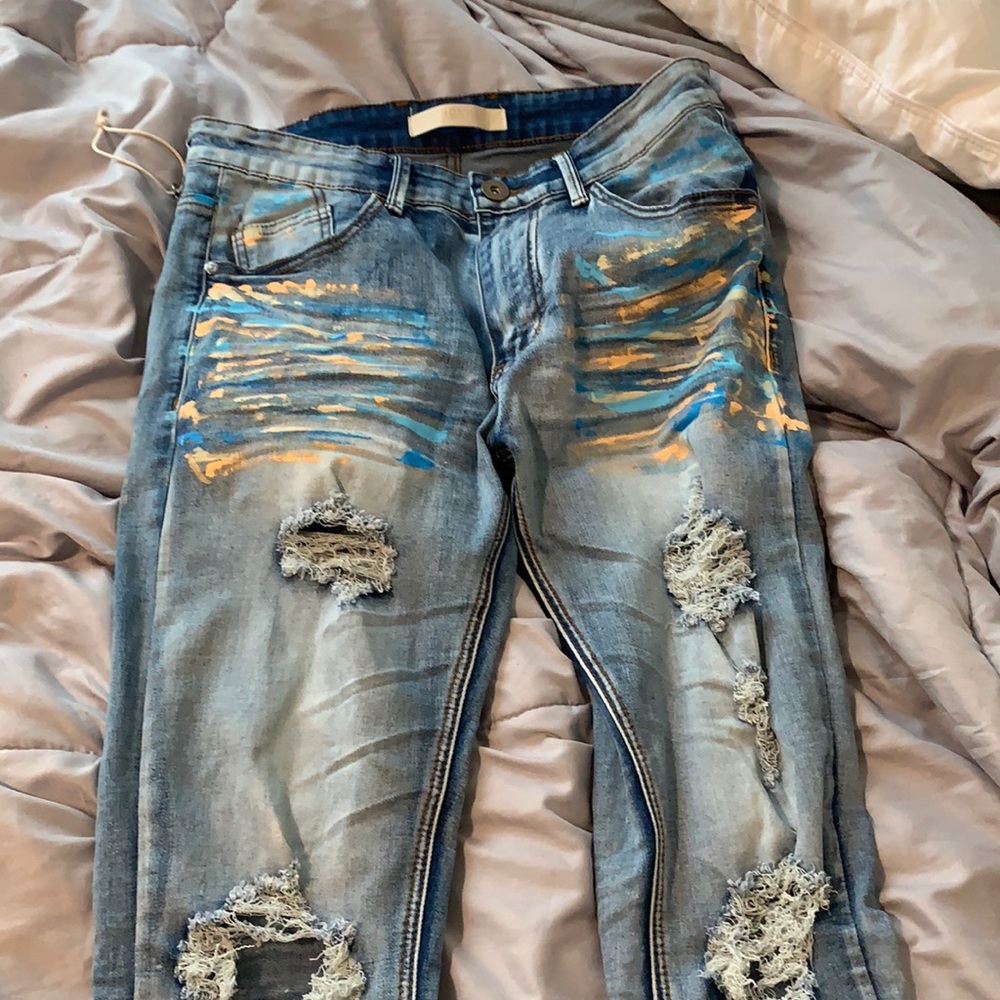 Orange and blue painted jeans